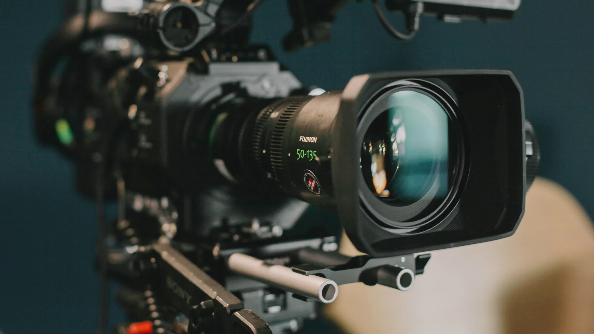 Sony cinema broadcast camera with Fujinon zoom lens framed for a multi-camera capture.