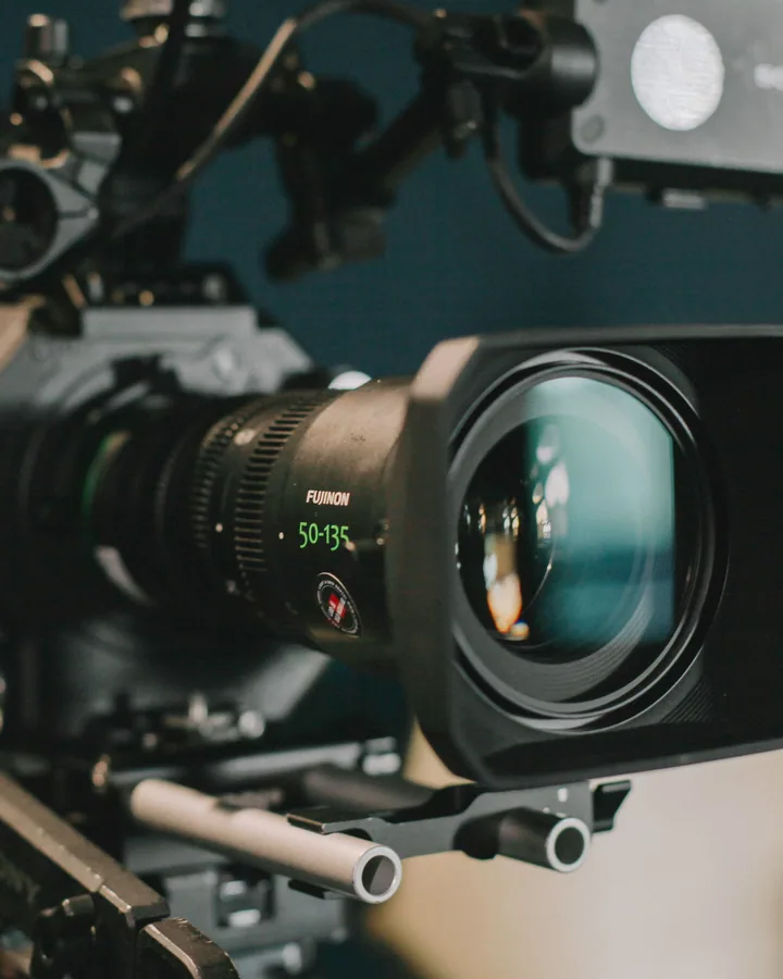 Sony cinema broadcast camera with Fujinon zoom lens framed for a multi-camera capture.